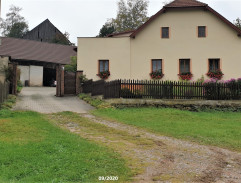 Před domem rychtáře Libry