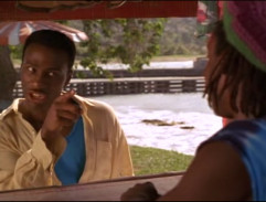 Sankův stánek s prodejem triček