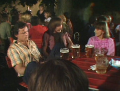 V zahradní restauraci