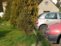 Policisté před domem Kozelky